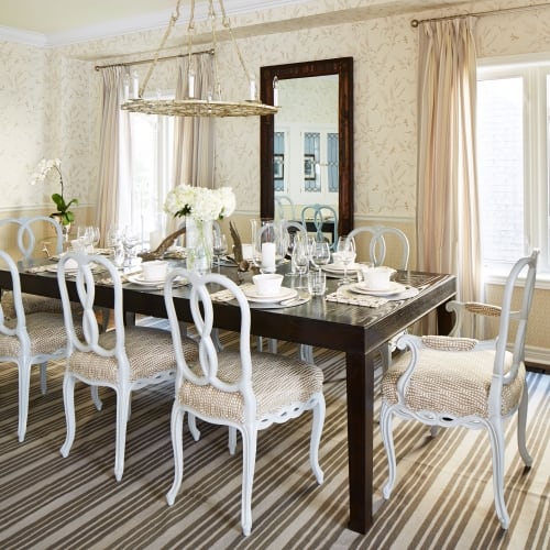 Subdivision House - dining room - white ornate chairs with contemporary brown dining table